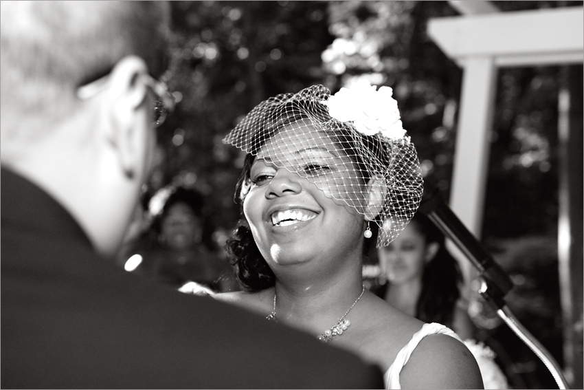 bride-laughing-while-saying-vows