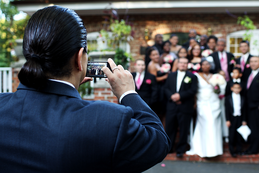 guest-taking-pics-of-bridal-party